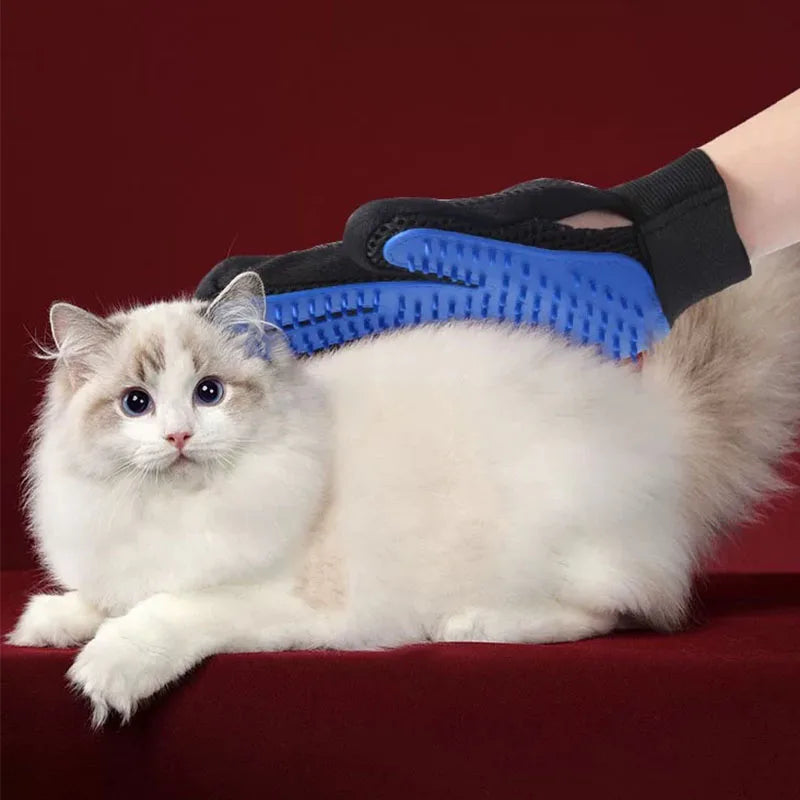 Pet deshedding glove being worn on a hand